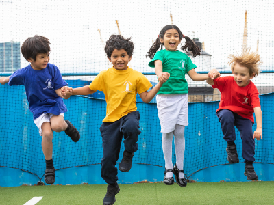 Students play at Faraday Prep School in East London 